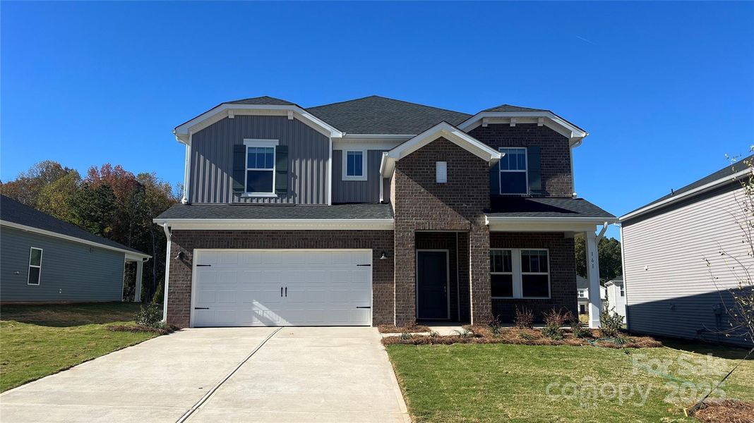 Front exterior of a new home in Nelson's Creek, Mocksville, NC, highlighting curb appeal (Image 1). Front exterior of a new home in Nelson's Creek, Mocksville, NC, highlighting curb appeal (Image 1).