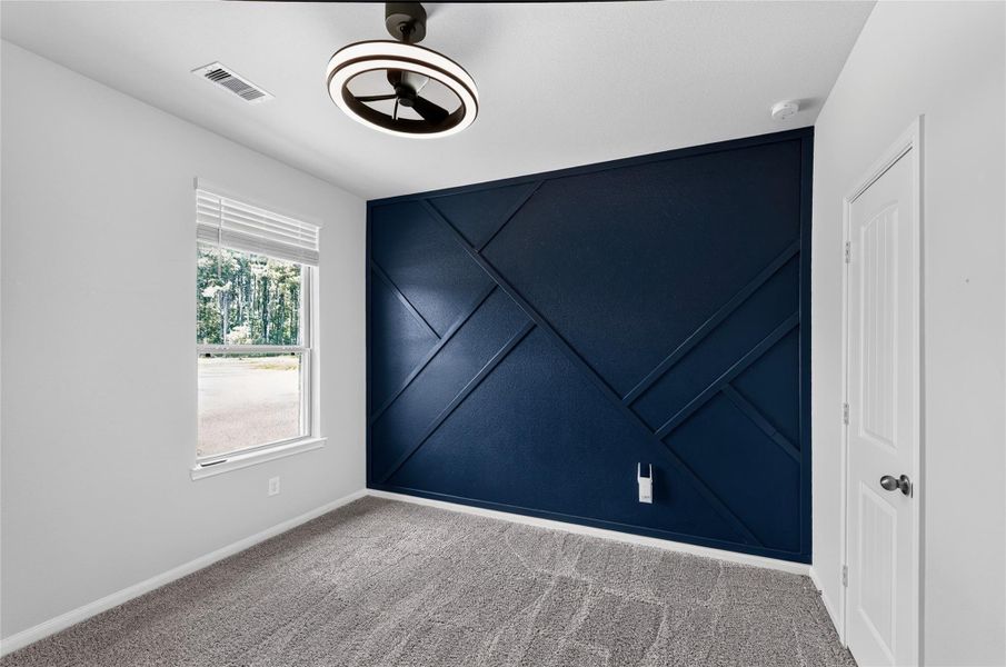 Second room with accent wall