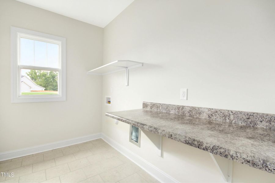 Amazing Laundry Room with folding shelf