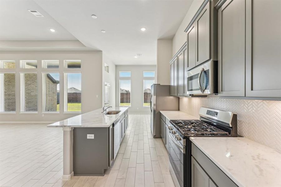 This kitchen is designed for cooking enthusiasts and those who love entertaining.