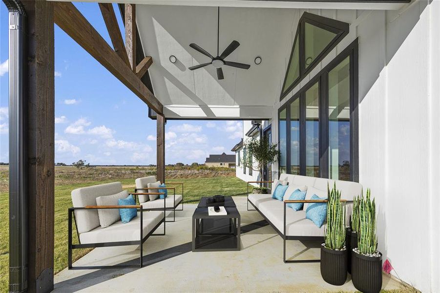 View of patio / terrace with ceiling fan and outdoor lounge area