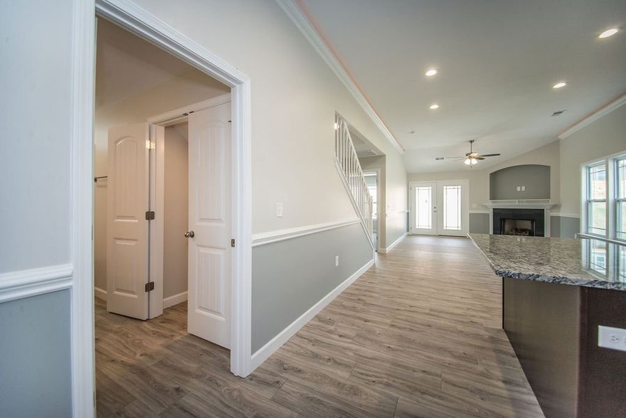 Representative unfurnished interior of a home built from the Quincy by Enchanted Homes in Lonesome Dove, San Antonio (Image 24).