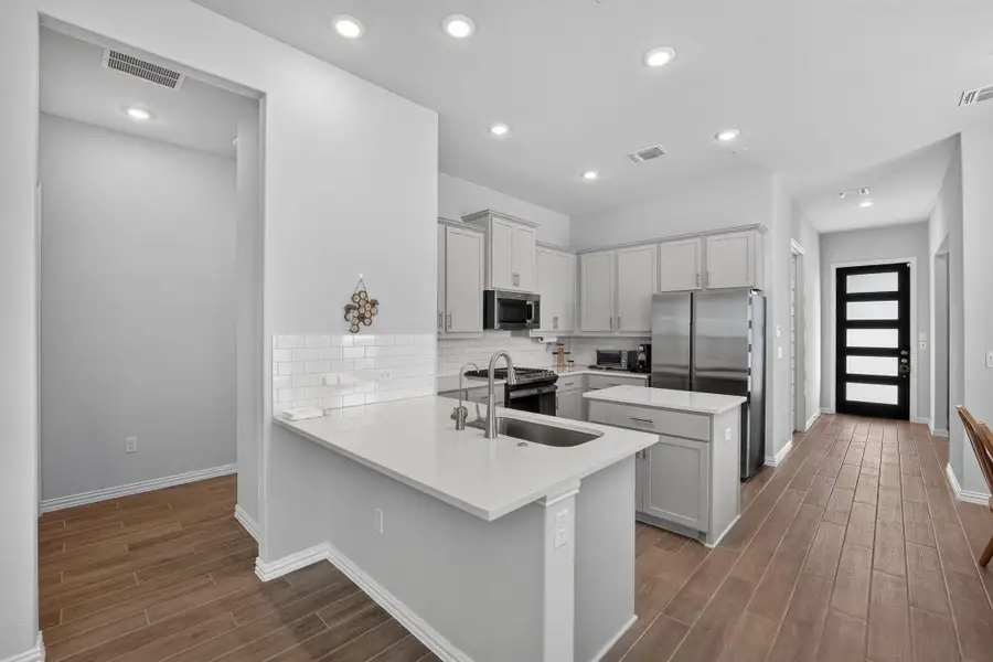 Furnished interior view inside a new home in Cascades at Onion Creek, Austin (Image 32).