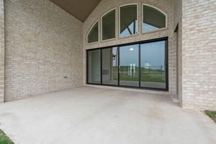 Exterior details and patio area of a home in Breezy Hill, Rockwall (Image 2). Exterior details and patio area of a home in Breezy Hill, Rockwall (Image 2).