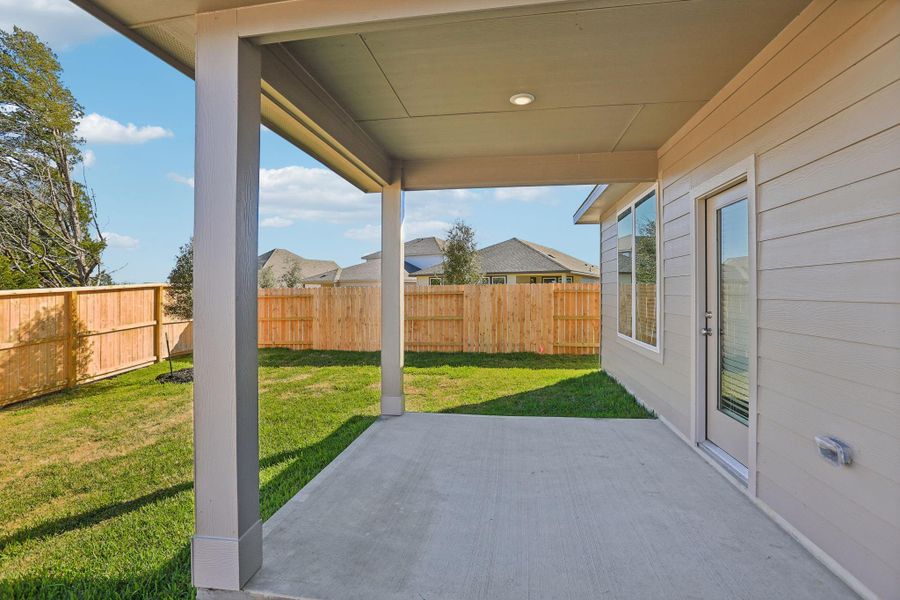 Exterior details and patio area of a home in Pine Lake Cove - Premier Series, Montgomery (Image 28).