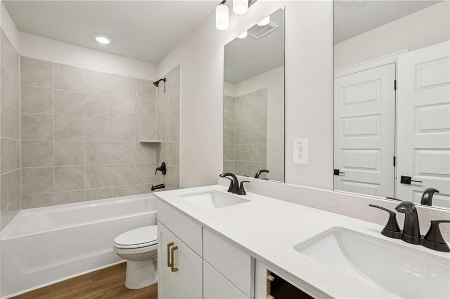 Furnished interior view inside a new home in Hemingway - Highland Series, Cumming (Image 7). Furnished interior view inside a new home in Hemingway - Highland Series, Cumming (Image 7).