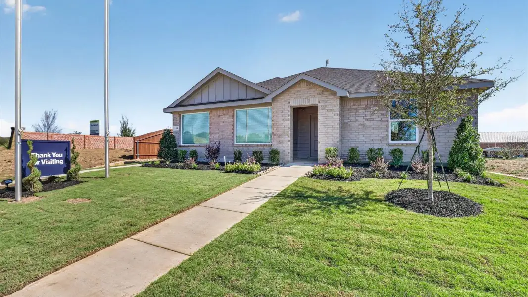 Representative exterior photo of a completed home built from the Austin by D.R. Horton in Somerset, Hillsboro, TX (Image 24).