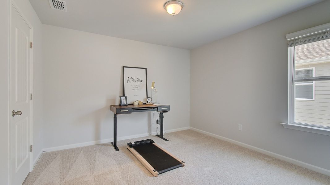 Representative furnished interior of a home built from the Layla II by DRB Homes in Towne Center, Hampton (Image 13).