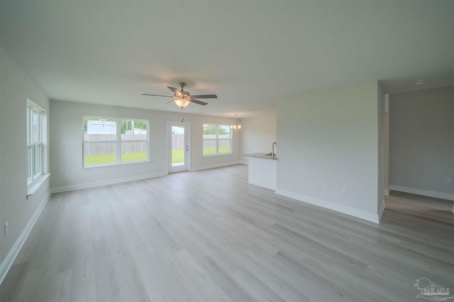 Representative unfurnished interior of a home built from the 1648 by Adams Homes in Parkland Place, Pace (Image 12).
