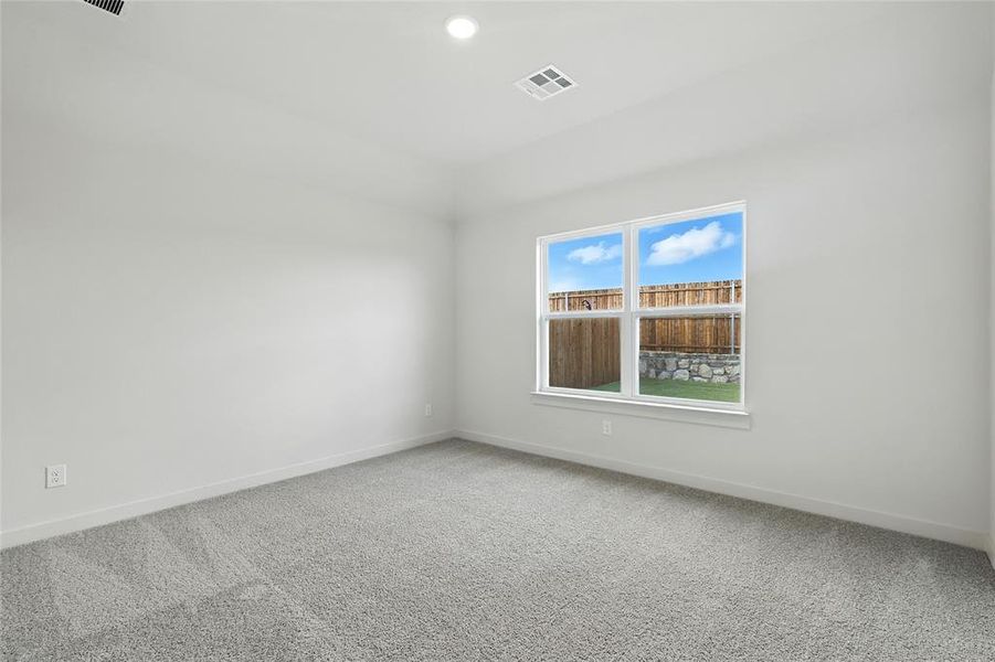 Spare room with carpet and recessed lighting Spare room with carpet and recessed lighting