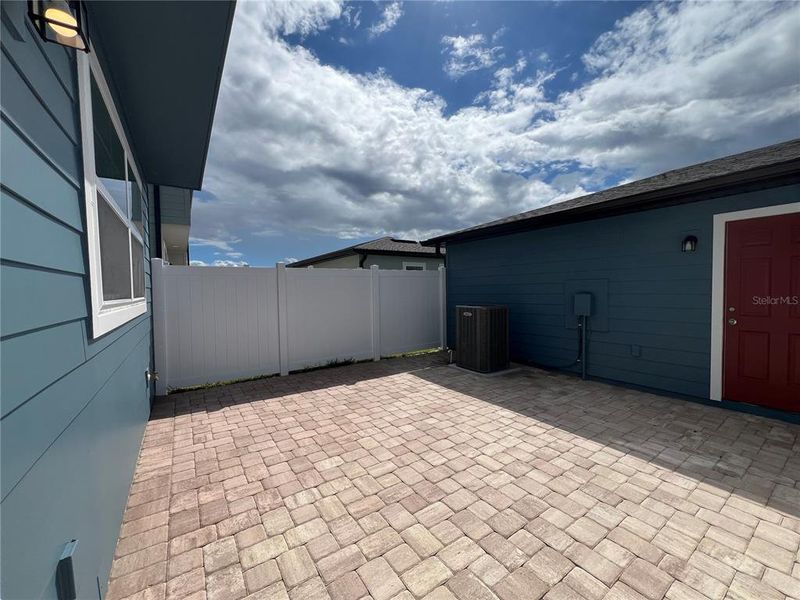 Exterior details and patio area of a home in Northlake Townhomes, Winter Garden (Image 24). Exterior details and patio area of a home in Northlake Townhomes, Winter Garden (Image 24).