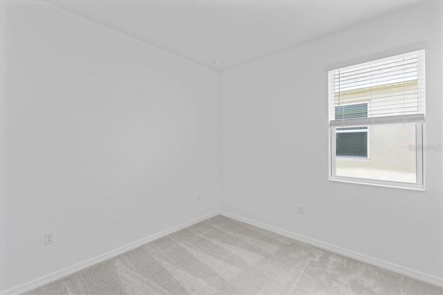 Spacious, unfurnished interior of a new home in Highfield at Twisted Oaks, Wildwood (Image 8).