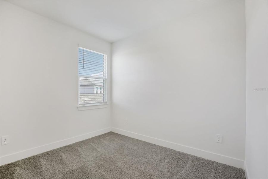 Spacious, unfurnished interior of a new home in Magnolia Bay - Reserve Series, Nokomis (Image 27).