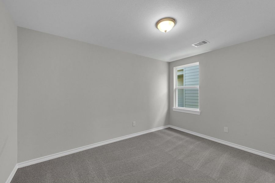 Spacious, unfurnished interior of a new home in The Enclave at Spring Branch, Conroe (Image 22).