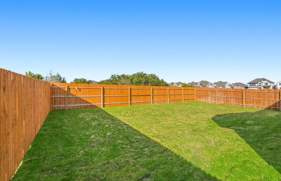 Exterior details and patio area of a home in Saddleback at Santa Rita Ranch, Liberty Hill (Image 3).