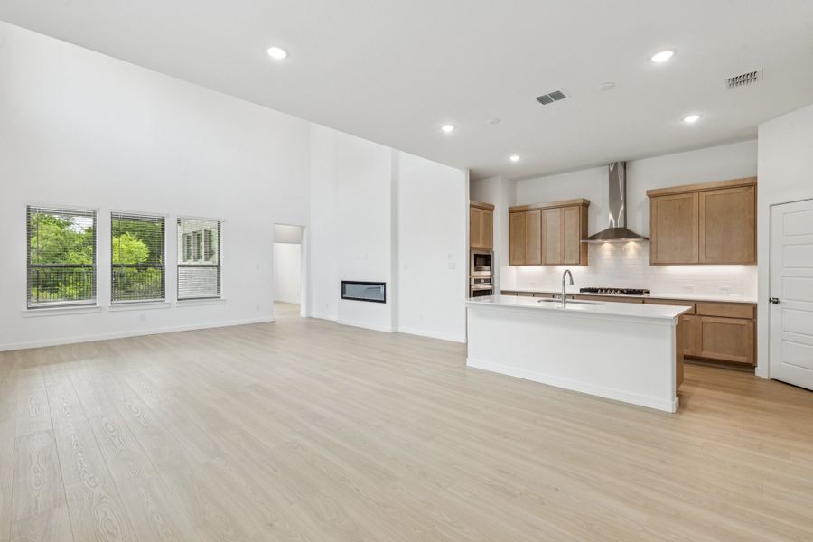 Open Floor Plan in the Da Vinci II home plan by Trophy Signature Homes – REPRESENTATIVE PHOTO