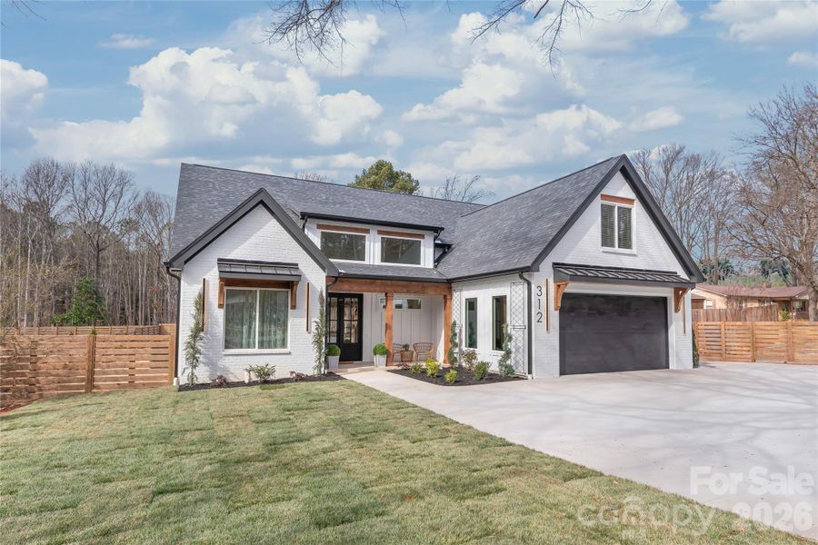 Front exterior of a new home in , Waxhaw, NC, highlighting curb appeal (Image 2). Front exterior of a new home in , Waxhaw, NC, highlighting curb appeal (Image 2).