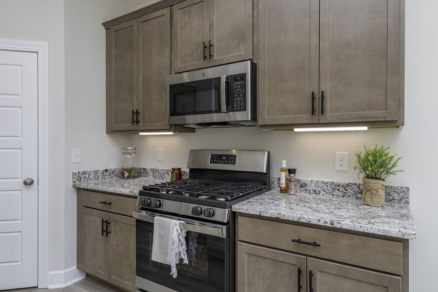 Representative furnished interior of a home built from the The Hunter by Cothran Homes in Holly Ridge, Greenville (Image 7).