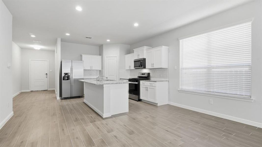 Furnished interior view inside a new home in Terra Trace, Fort Worth (Image 6). Furnished interior view inside a new home in Terra Trace, Fort Worth (Image 6).