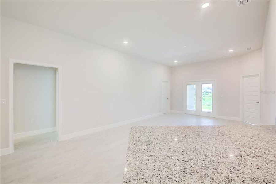 Spacious, unfurnished interior of a new home in Aviary at Rutland Ranch, Parrish (Image 15).