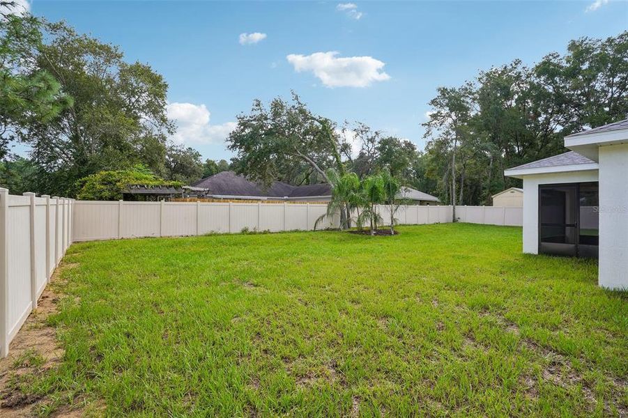 Exterior details and patio area of a home in , Citrus Springs (Image 4).