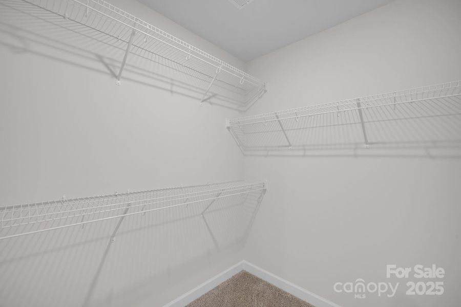 Primary walk-in closet