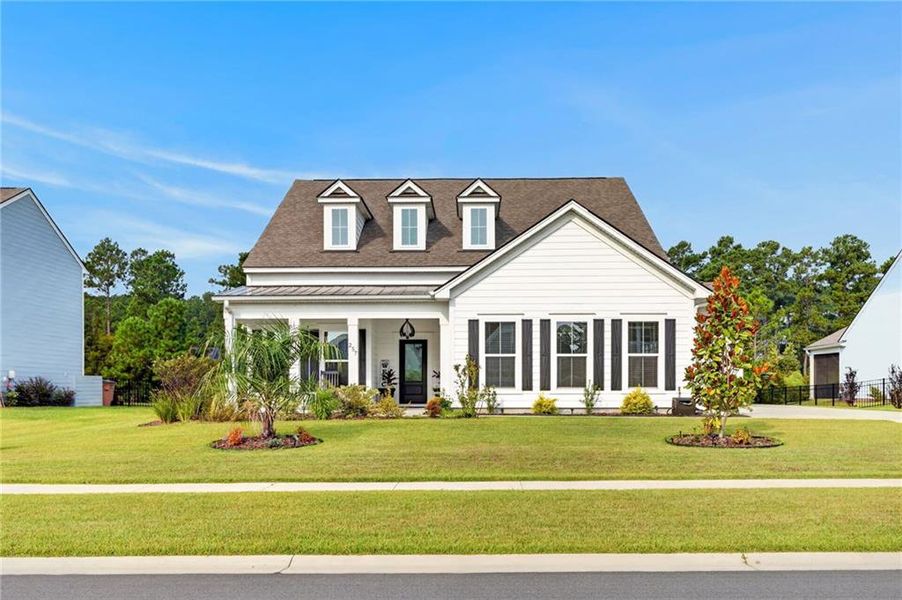 Front exterior of a new home in , Richmond Hill, GA, highlighting curb appeal (Image 2). Front exterior of a new home in , Richmond Hill, GA, highlighting curb appeal (Image 2).