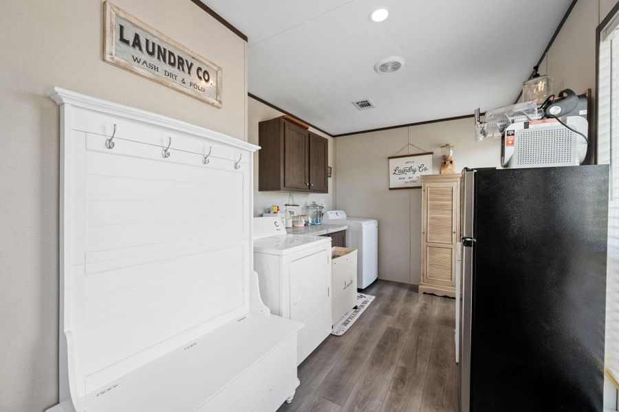 Laundry Room with access to back patio