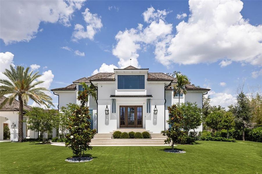 Front exterior of a new home in , Sarasota, FL, highlighting curb appeal (Image 23). Front exterior of a new home in , Sarasota, FL, highlighting curb appeal (Image 23).