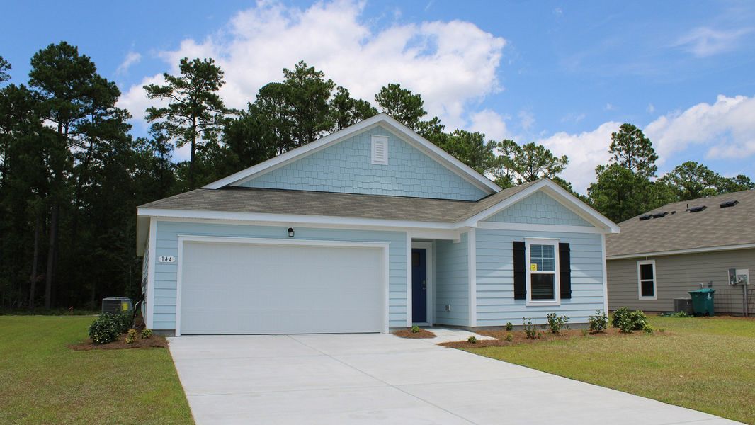 Front exterior of a new home in Kingston Bay, Conway, SC, highlighting curb appeal (Image 2).