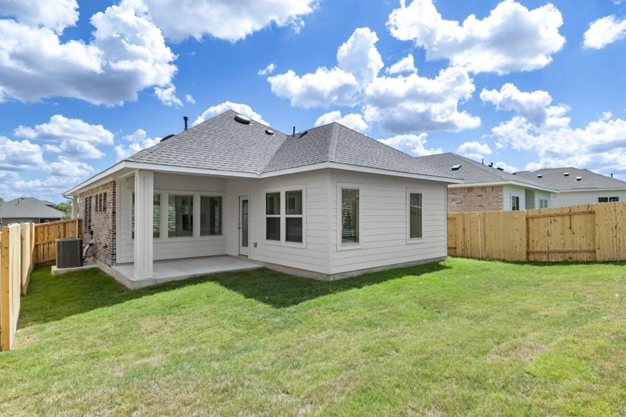Exterior details and patio area of a home in Crosswinds, Kyle (Image 3).