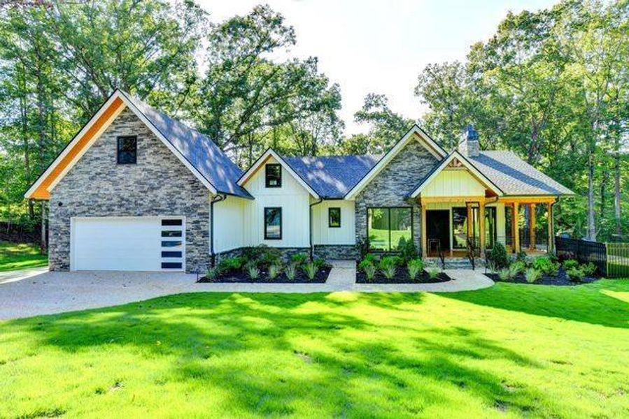 Front exterior of a new home in , Gainesville, GA, highlighting curb appeal (Image 27).