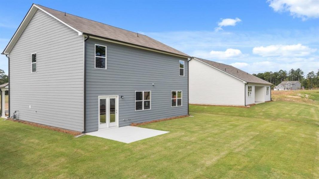 Exterior details and patio area of a home in Fairway 17 at Mirror Lake, Villa Rica (Image 4). Exterior details and patio area of a home in Fairway 17 at Mirror Lake, Villa Rica (Image 4).