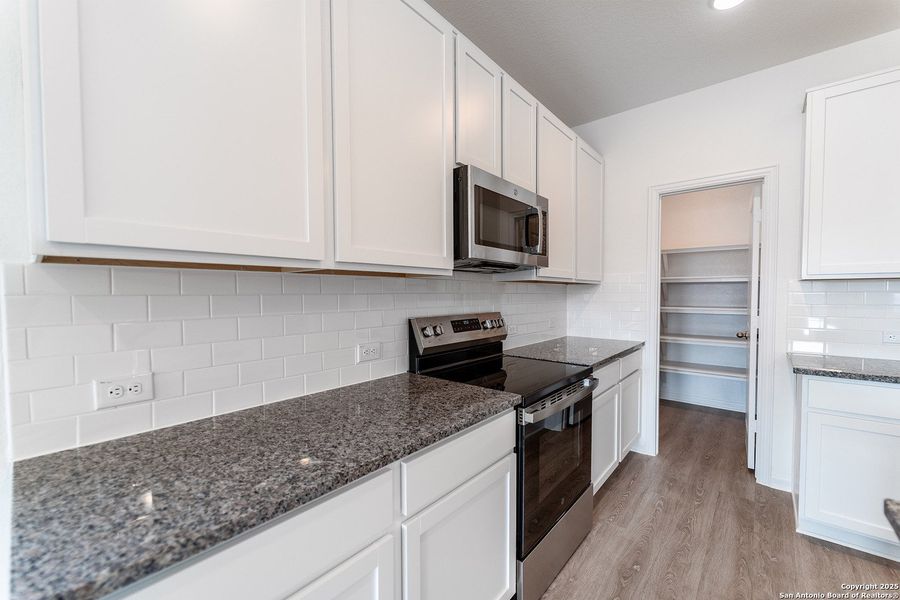 Furnished interior view inside a new home in Katzer Ranch, Converse (Image 4).