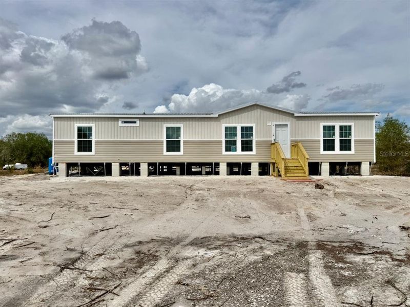 In-progress construction of a new home in , Okeechobee, FL (Image 36).
