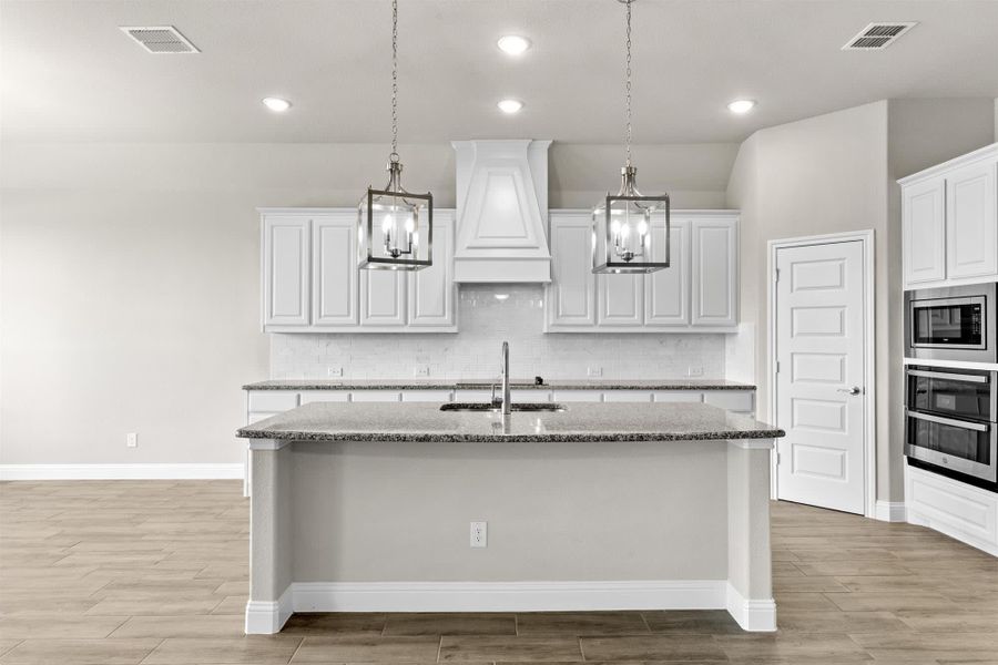 Kitchen | Concept 2796 at Coyote Crossing in Godley, TX by Landsea Homes