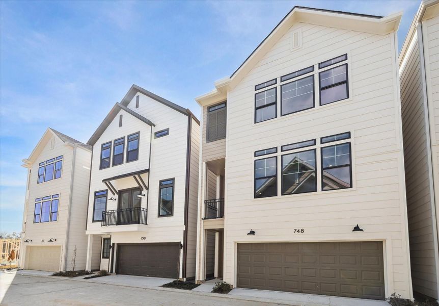 Soft Contemporary townhome elevation with modern finishes Soft Contemporary townhome elevation with modern finishes
