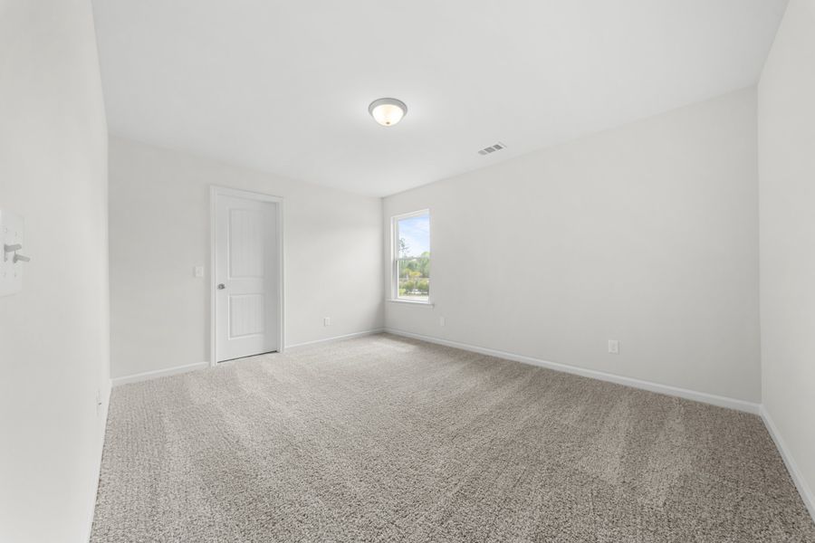 Representative unfurnished interior of a home built from the The Madison by Smith Family Homes in Camden Crossing, Savannah (Image 29).