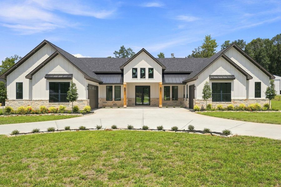 Front exterior of a new home in , Willis, TX, highlighting curb appeal (Image 26).