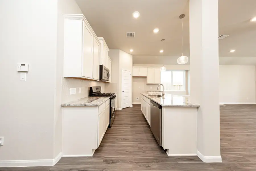 Photos are a representation of the floor plan. Options and interior selections will vary.