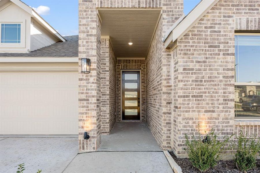 Exterior details and patio area of a home in Godley Ranch Classic, Godley (Image 21).