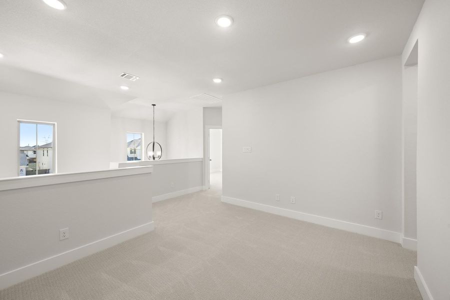 Spacious, unfurnished interior of a new home in Terrace Collection at Harvest, Argyle (Image 19).