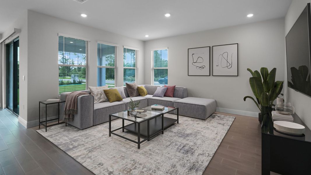 Representative furnished interior of a home built from the BELLMORE by D.R. Horton in Waterleigh, Winter Garden (Image 4).