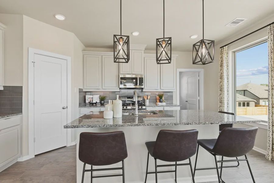 Representative furnished interior of a home built from the Springfield by Chesmar Homes in Balmoral, Humble (Image 9).
