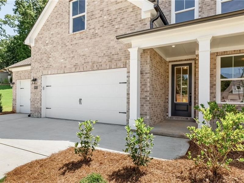 Exterior details and patio area of a home in Melody Lakeside Estates, Buford (Image 1).