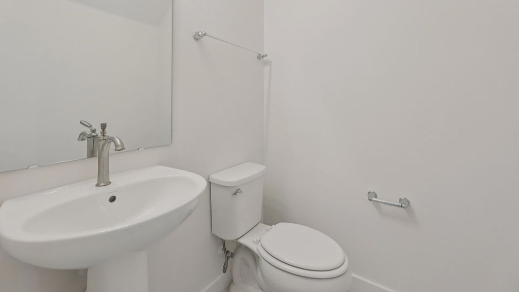 Half Bath in the Naples Floor Plan by DRB Homes Half Bath in the Naples Floor Plan by DRB Homes