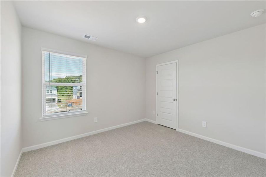 Spacious, unfurnished interior of a new home in Hemingway - Reserve Series, Cumming (Image 39).
