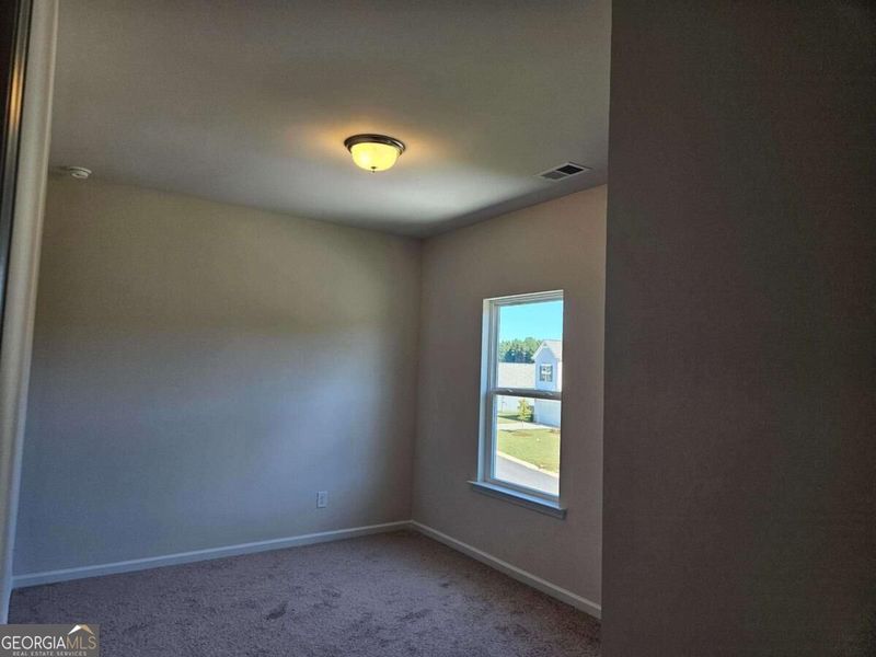 Spacious, unfurnished interior of a new home in Maddox Station, Eatonton (Image 27).