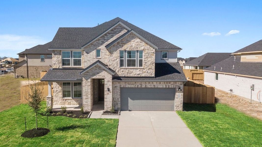 Representative exterior photo of a completed home built from the Chloe by D.R. Horton in Alexander 55' Homesites, Pearland, TX (Image 1). Representative exterior photo of a completed home built from the Chloe by D.R. Horton in Alexander 55' Homesites, Pearland, TX (Image 1).