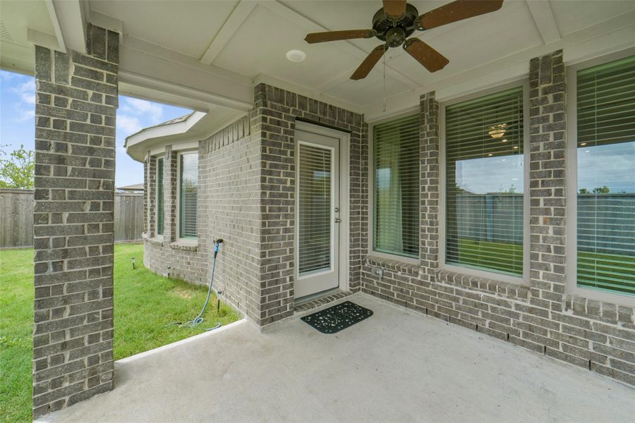Exterior details and patio area of a home in Bridgeland, Cypress (Image 4).